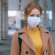 lady with mask covering mouth and nose